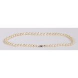 Pearl necklace, the string of pearls with a sapphire and diamond set clasp 47cm long