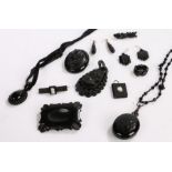 Collection of jet jewellery, to include a locket, brooches, a cameo pendant, necklace, earrings, (