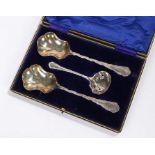 Plated fruit serving set, consisting of two serving spoons and a sifter spoon, housed in a fitted