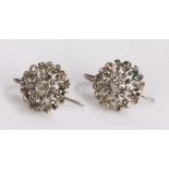 Pair of diamond set earrings, the foliate design earrings set with rose cut diamonds, 14mm diameter