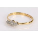 18 carat gold diamond set ring, with three diamonds set to the head, ring size P1/2