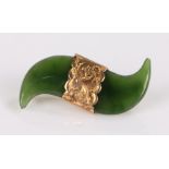 New Zealand 9 carat gold mounted jadeite, in the form of a tigers claw brooch, 27mm long