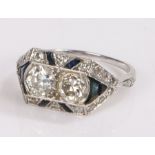 Art Deco diamond and sapphire set ring, with two round cut diamonds with a diamond and sapphire