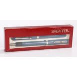 Sheaffer pen set, in blue, to include a fountain pen and a ball point pen, cased