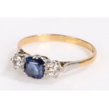 18 carat gold sapphire and diamond set ring, with a central sapphire flanked by a diamond to