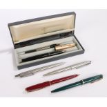 Parker, to include a fountain pen with a gold plated cap, two stainless steel ball point pens, a red