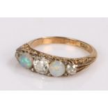 18 carat godl opal and diamond set ring, with two opals and three diamonds, ring size O