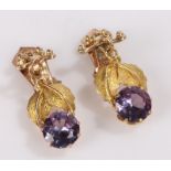 Pair of 14 carat gold amethyst earrings, with a flower design to each, 30mm long