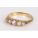 18 carat gold pearl and diamond set ring, with three diamonds and two pearls to the head, ring
