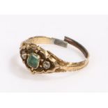 19th Century emerald and diamond set ring, with a central emerald flanked by diamonds, shank cut,