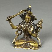 Bodhisattva Manjushri - Tibet nach 1900, Gelbguss, in Padmasana sitzend, mit dem Schwert der