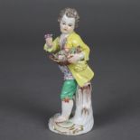 Porzellanfigur "Gärtnerknabe" - Meissen, unterglasurblaue Schwertermarke, Entwurf von Johann Joachim