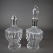 Zwei Karaffen - farbloses Kristallglas, Facettenschliff, Montierung Silber (835/000), gepunzt, H.