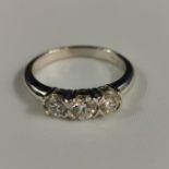 18CT WHITE GOLD DIAMOND 3 STONE RING WITH CIRCA 0.85 CARAT OF DIAMONDS