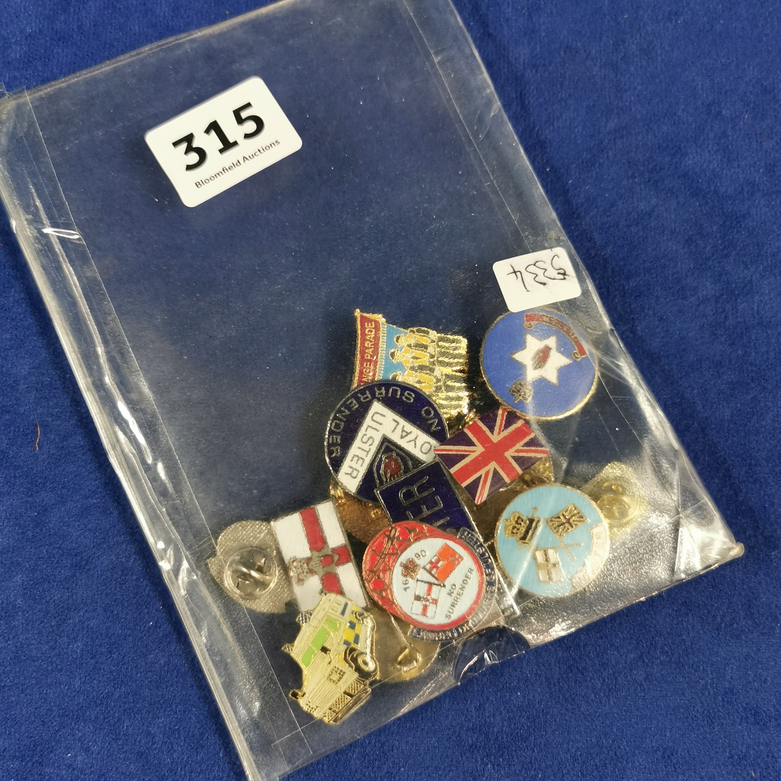 BAG OF ULSTER BADGES