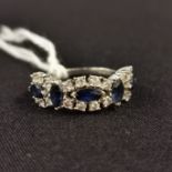 18CT GOLD SAPPHIRE & DIAMOND RING