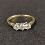 18 CARAT GOLD DIAMOND 3 STONE RING WITH HALF CARAT OF DIAMONDS