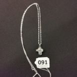 CROSS LOCKET ON SILVER CHAIN