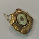 9CT GOLD AND DIAMOND BROOCH