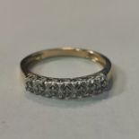 9CT GOLD 7 STONE DIAMOND RING