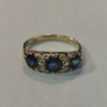 9CT GOLD SAPPHIRE AND DIAMOND RING