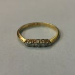 18 CARAT GOLD 5 STONE DIAMOND RING