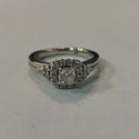 18CT WHITE GOLD AND DIAMOND RING