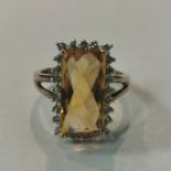 9CT GOLD TOPAZ AND DIAMOND RING