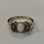 9CT GOLD OPAL AND GARNET RING