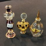 3 PERFUME BOTTLES