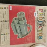 VINTAGE TOY PROJECTOR WITH SLIDES