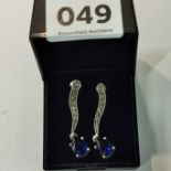 SILVER PAIR OF MARCASTLE AND SAPPHIRE COLOURED DROP EARRINGS