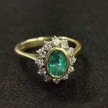 18CT DIAMOND .60 AND EMERALD RING