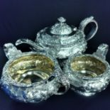 HEAVILY DECORATED 3 PIECE SILVER TEA SERVICE - LONDON APPROX 1.490 KG