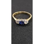 18CT GOLD DIAMOND AND TANZANITE RING 0.20 CARAT OF DIAMONDS