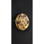 VICTORIAN GOLD (TESTS TO) AND AMETHYST BROOCH