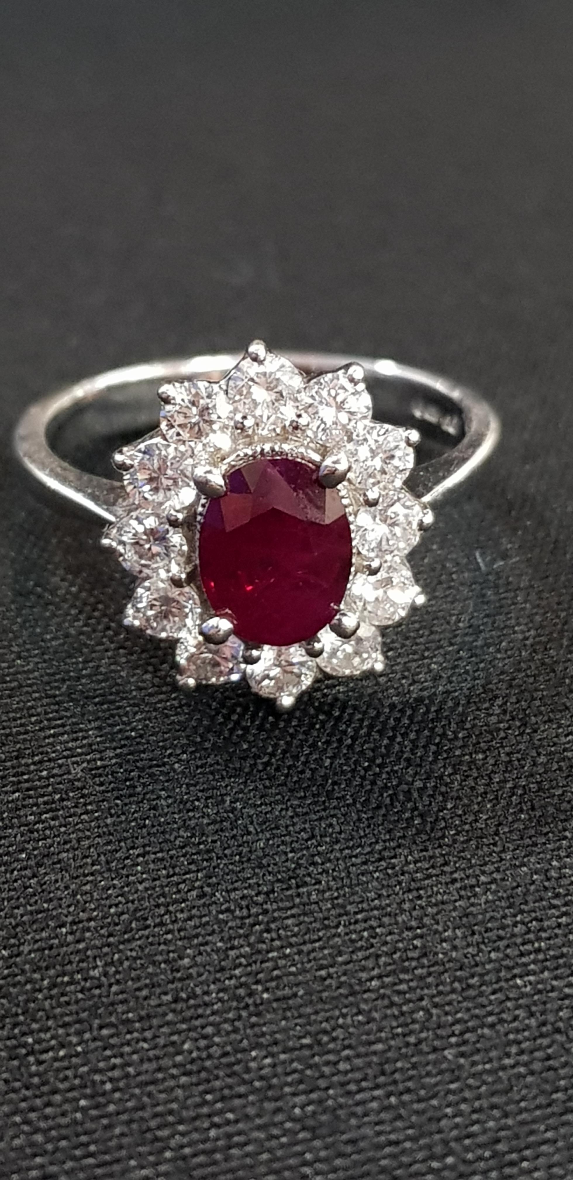 18CT WHITE GOLD RUBY AND DIAMOND RING WITH 1 CARAT OF DIAMONDS