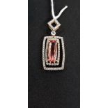 18CT GOLD DIAMOND AND TOPAZ PENDANT APPROX 8.29 GRAMS