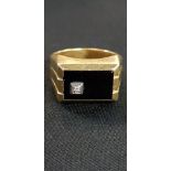 HEAVY 18CT GOLD AND DIAMOND AND ONYX RING APPROX 11 GRAMS