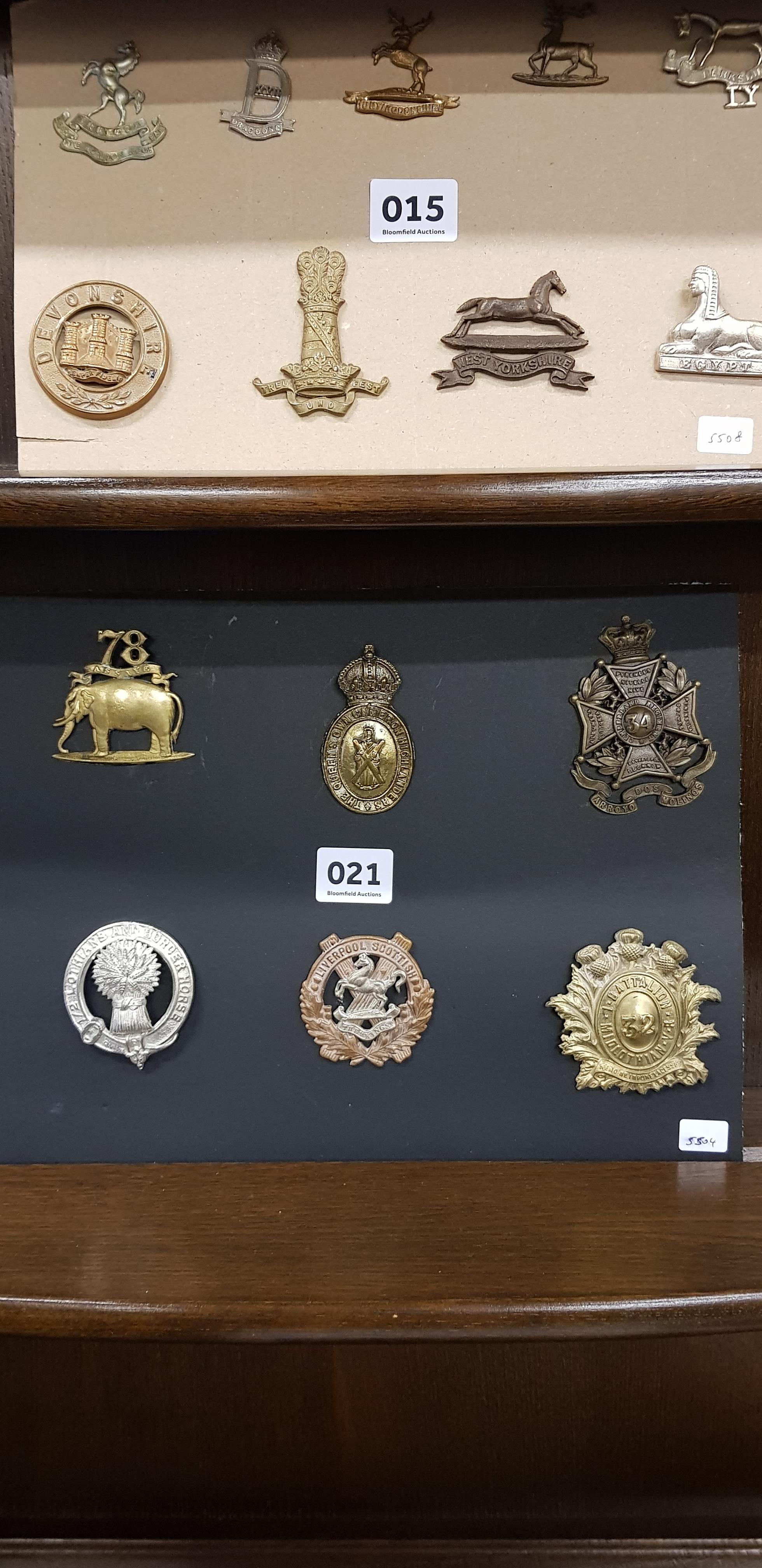 SHEET OF MILITARY BADGES