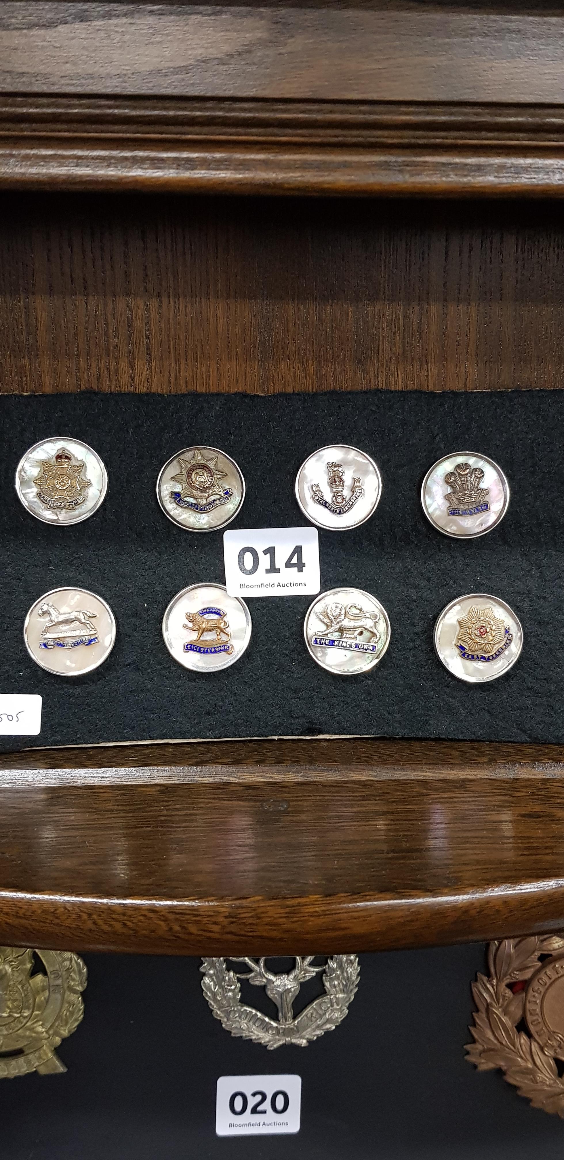 SHEET OF MILITARY BADGES