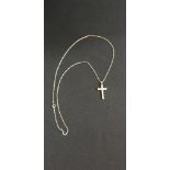 9CT GOLD CROSS, RHODIUM PLATED SET WITH 17 DIAMONDS