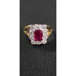 18CT YELLOW GOLD RUBY (1.1 CARAT) AND DIAMOND (0.70 CARAT) CLUSTER RING