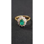 18CT GOLD DIAMOND AND EMERALD RING