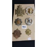 SHEET OF MILITARY BADGES