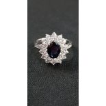 18CT GOLD SAPPHIRE AND DIAMOND (1 CT) CLUSTER RING