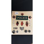 SHEET OF RUC BUTTONS AND BADGES ETC