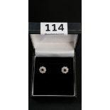 PAIR OF 9CT WHITE GOLD RUBY AND DIAMOND EARRINGS