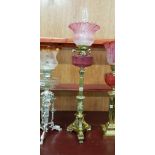 TALL ANTIQUE BRASS OIL LAMP WITH RUBY BOWL AND RUBY SHADE