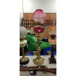 LARGE BRASS ANTIQUE OIL LAMP WITH RUBY BOWL AND SHADE
